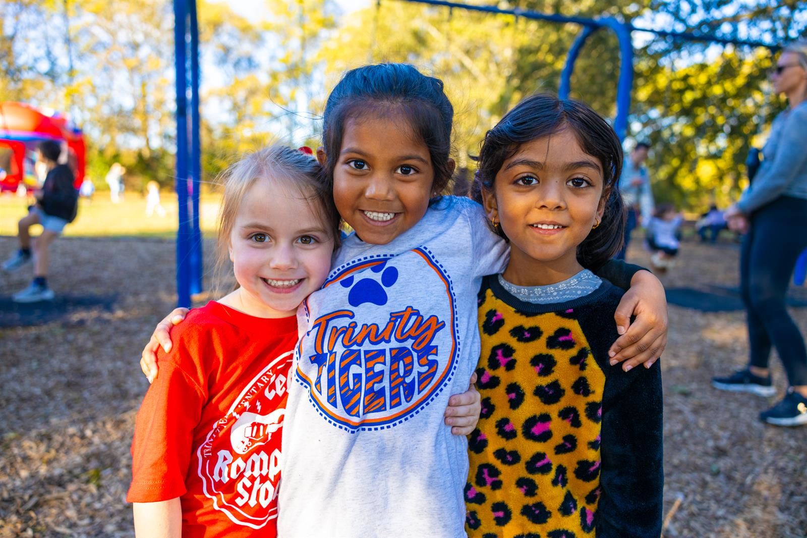 3 girls smiling